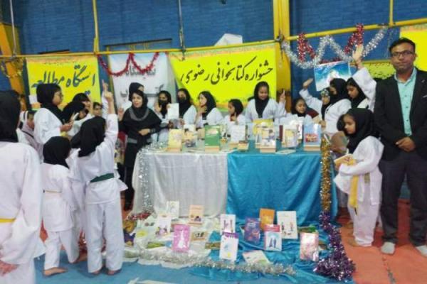 ایستگاه جشنواره کتابخوانی رضوی به استادیوم های شهرستان حاجی آباد رسید